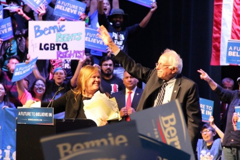 Democratic presidential candidate Bernie Sanders waves in conclusion of the rally with his wife Jane O'Meara Sanders. More than 7,000 attended the rally on Saturday at the Verizon Theatre at Grand Prairie. Photo by Amanda Hair.