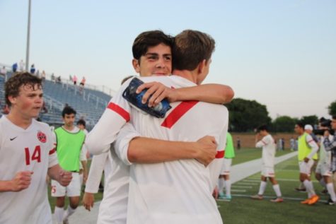 Coppell High School sophomore Wyatt Priest hugs senior Stejpan Kilic after the match on Friday at Birkelbach Field in Georgetown. The Cowboys defeated Cinco Ranch, 1-0 in the Class 6A state semifinals, and will be moving on to the state championship.