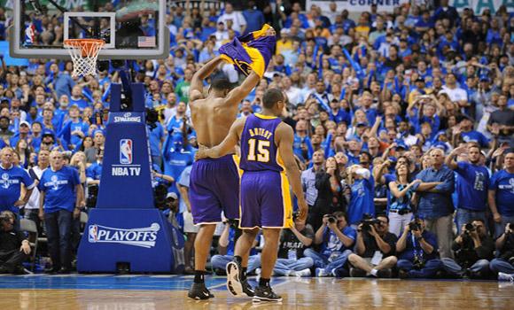 Lakers Ron Artest escorts Andrew Bynum off the court after getting ejected in Game 4 of the NBA Western Conference Playoffs. The Dallas Mavericks defeated the Los Angeles Lakers, 122-86. (Wally Skalij/Los Angeles Times/MCT)