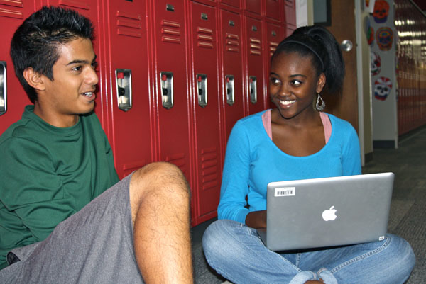 Sydney Williams, EMAC sophomore, interviews PSA sophomore Vivit Chetry for a halloween story to be posted on the Weebly website. Photo by Regan Sullivan.