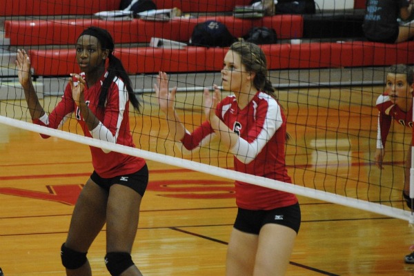 Juniors Chiaka Ogbogu and Cassidy Pickrell focus as they wait for the next play. Photo by Rachel Bush.