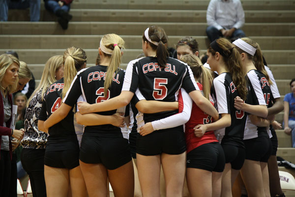 THe Coppell Cowgirls celebrate their win as they proceed into the next round in hopes of going to state. Photo by Ivy Hess.