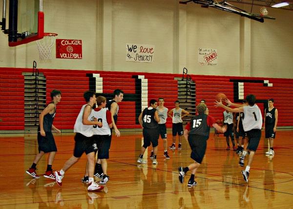Varsity and Junior Varsity Boy Basketball players practice rigorous drills and scrimmages everyday afterschool in preparation for the oncoming Basketball season. Photo by Trevor Stiff. 