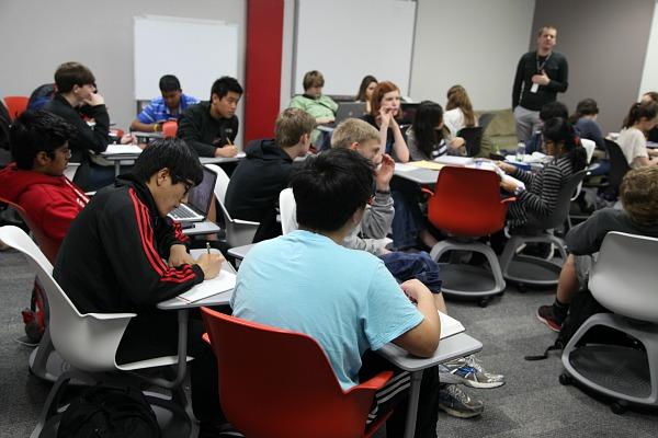 CISD is currently investing into remodeling Coppell High School’s classrooms to create a 21st Century learning experience for it’s students. Mr. Rohloff’s room is one of the few classrooms at CHS that have already been remodeled.  The remodeling included the installment of new desks, seats, couches, smart boards, paint for the walls, etc. Photo by Trevor Stiff.