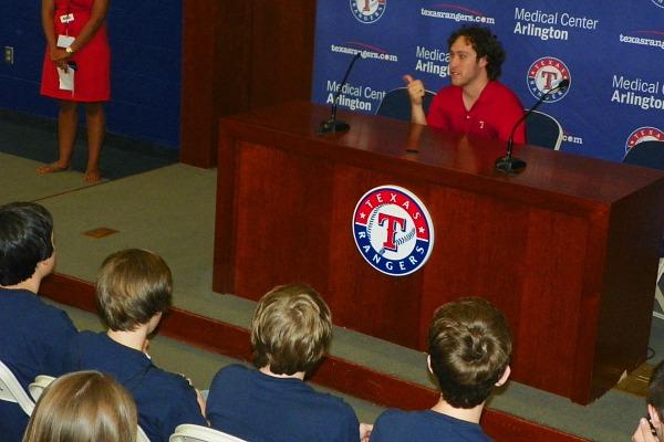 A Texas Rangers reporter talks to the EMAC Academy students in the press conference room about his job and internships with the Texas Rangers. Photo by Trevor Stiff.