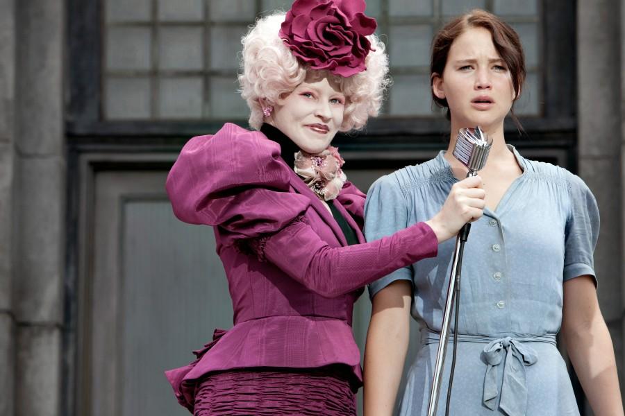 Effie Trinket (Elizabeth Banks, left) and Katniss Everdeen (Jennifer Lawrence) star in The Hunger Games. (Courtesy Murray Close/MCT)