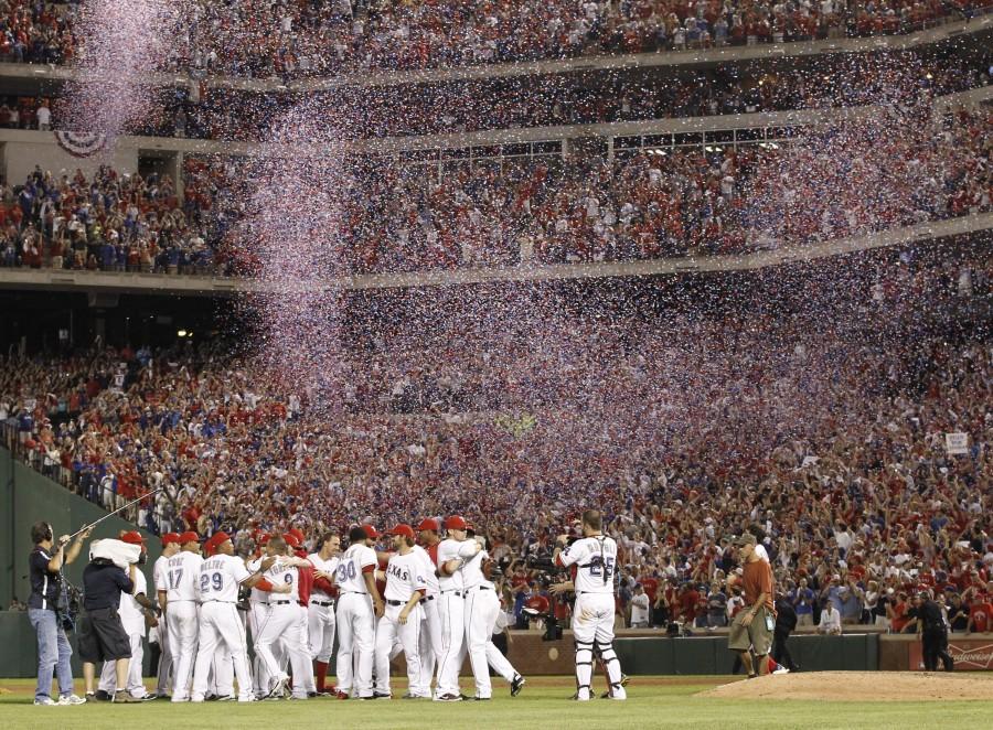 The Texas Rangers celebrate after a convincing 15-5 win over the Detroit Tigers in Game 6 of the American League Championship Series in Arlington, Texas, Saturday, October 15, 2011. The triumph returns the Rangers to the World Series for the second year in a row. (Ron T. Ennis/Fort Worth Star-Telegram/MCT)