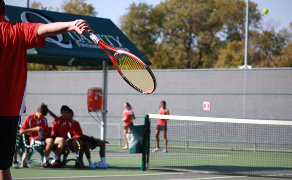 Senior tennis player continues sport through coaching