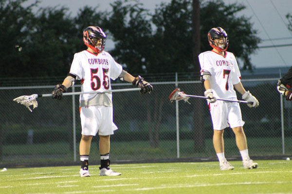 Senior defenders Logan McCullough and Zane Zoda await the ball to come their way as Coppell takes the ball to Ravenwoods end of the field. Photo by Ivy Hess.