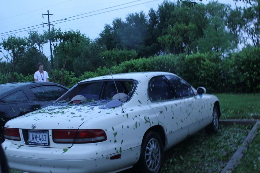 Photo courtesy Blake Bryan. Large hail at New Tech High School, shattered many windshields on Tuesday. Including the car of sophomore Blake Bryan. 