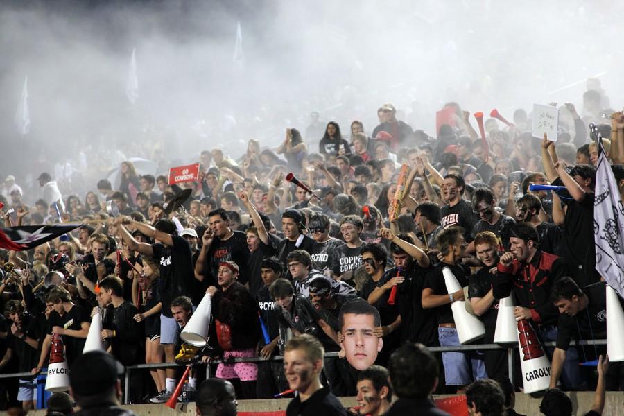 Passionate Coppell fans throw up baby powder at the beginning of the game to show their spirit, leaving a smoky effect. Photo by Rinu Daniel.