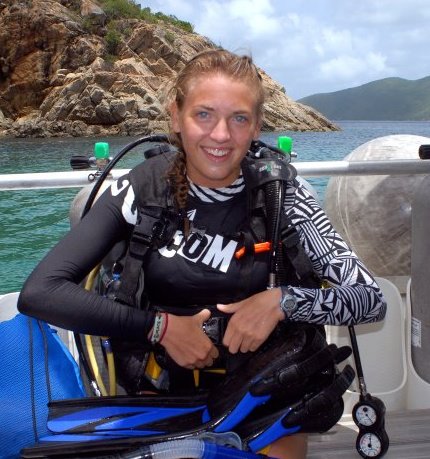 Megan Luttmer puts on her scuba gear before she dives into the waters of the British Virgin Islands at her summer camp Sail Caribbean. Photo courtesy of Megan Luttmer 
