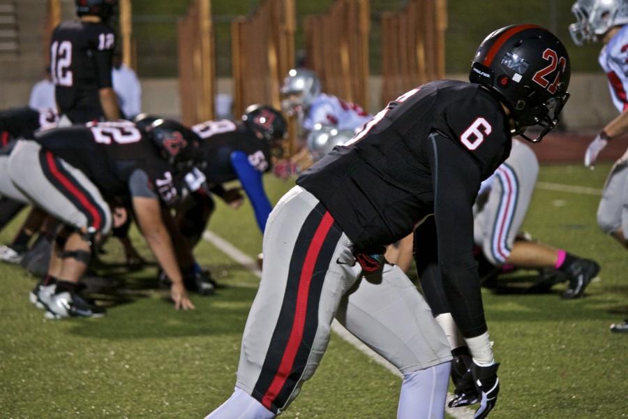 Senior Cameron Smith prepares to make a play for the Coppell Cowboys at Fridays game. Coppell defeated Marcus, 31-0. The Cowboys will be playing the Lewisville Farmers tonight at home. Photo by Regan Sullivan.