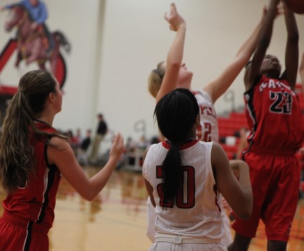 The Coppell Cowgirls won their first District 5-5A game against the Denton Ryan Lady, Raiders 36-32. Photo by Rowan Khazendar