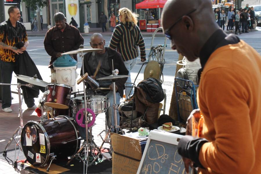 Street+musicians+Larry+Hunt+and+Edward+Jackson+performing+for+tourists+and+citizens.+Photo+by+Stephanie+Alexander