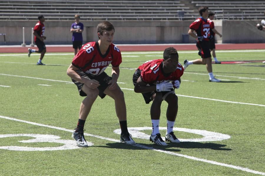 Sophomore cornerbacks Jacob Murray and junior Troy Parker battle against each other during a spring practice