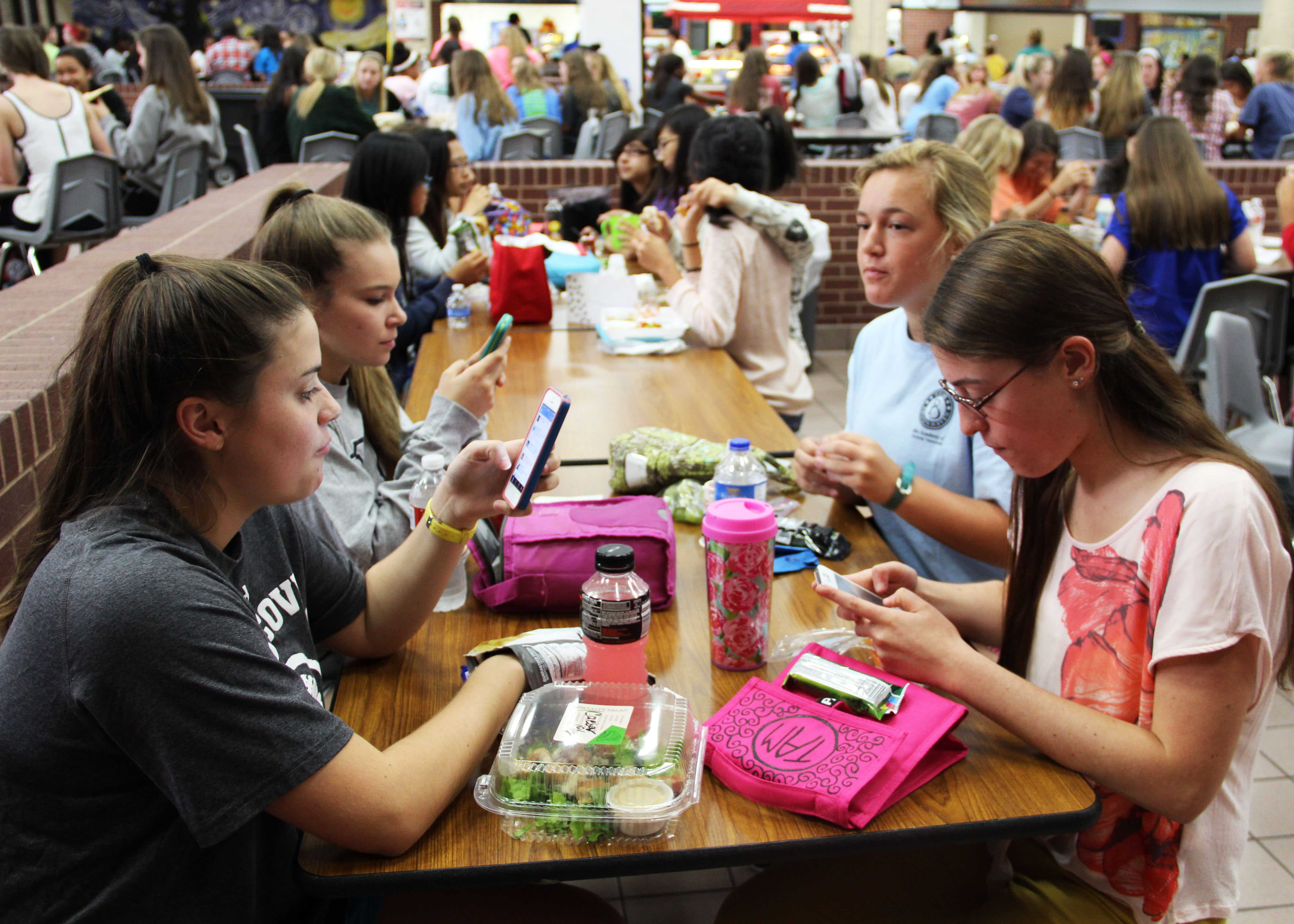 Cell phones serve as plague to social interaction 