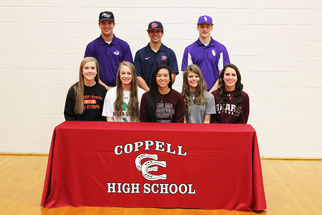 Coppell High School senior athletes Mary-Kate Marshall (Oregon State, volleyball), Kate Dicken (University of North Texas, volleyball), Hannah Jiao (Texas ATM International, golf), Taylor Icenberger (Texas Wesleyan, golf), Erika Zimmer (Missouri State, softball), Drew Hanson (Abilene Christian University, baseball), Cal Hernandez (Dallas Baptist University, baseball) and Quinn Moser (Ouachita Baptist, baseball) signed letters of intent this morning in the large gym. Photo by Nicole Messer.
