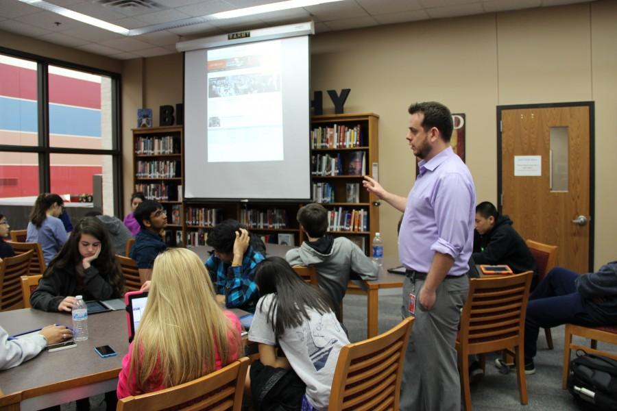 Mr. Caussey teaching his new AP World History-Blended class in the library. Photo by Sandy Iyer.