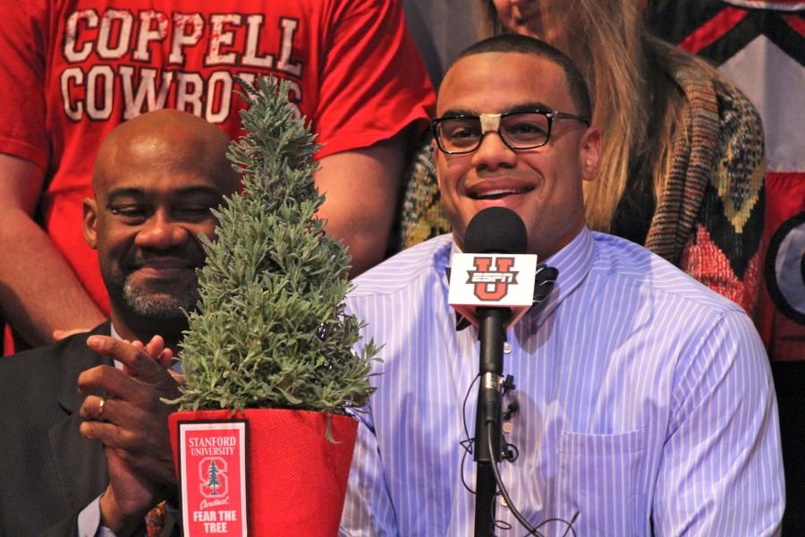 Senior defensive end Solomon Thomas is all smiles after announcing he will be playing college football for Stanford University on live television. Thomas chose Stanford over the University of Arkansas and the University of California-
Los Angeles in the Coppell High School auditorium on National Signing Day. Photo by Regan Sullivan.