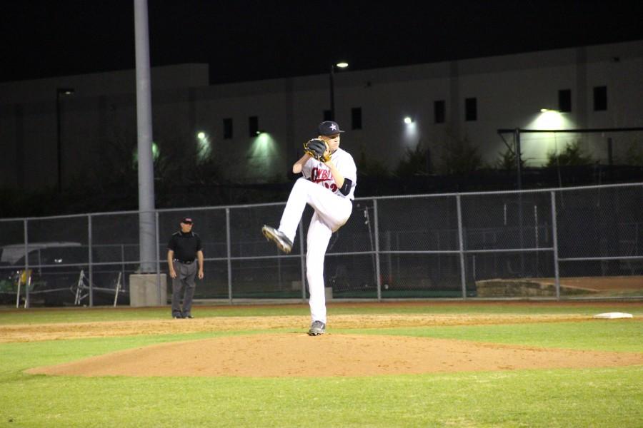 Junior righthanded pitcher Jensen Elliott gets ready to give an opposing batter the heat in Coppells Mar. 18 matchup against the Flower Mound 
Marcus Marauders. The Cowboys will take the rubber on Tuesday night against Denton Ryan. Photo by Alyssa Frost.  