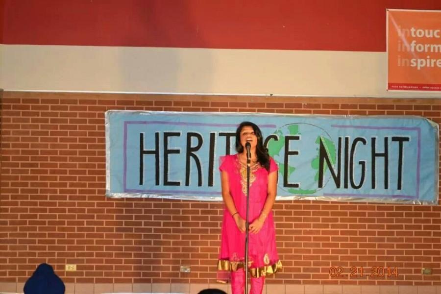 Junior Aleesha Johnson sings Turning Tables by Adele at Heritage Night in the Coppell High School Commons.