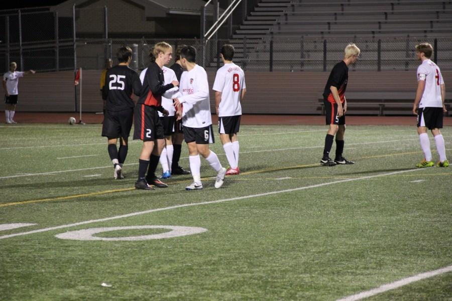 Coppell junior midfielder Drew Brinda positions himself to defend a corner kick from the Marcus Marauders in the teams Feb. 14 match. Coppell defeated the Marauders 2-0 in the regional final match on Saturday, Apr. 12. Photo by Shannon Wilkinson.  
