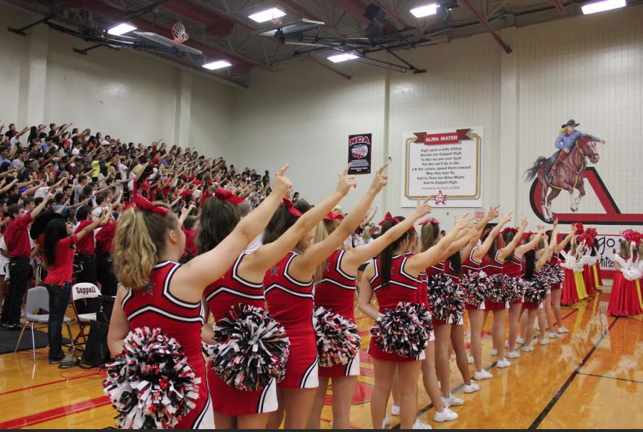CHS students sing the alma mater at the end of the first pep rally of the 2014-2015 school year. 