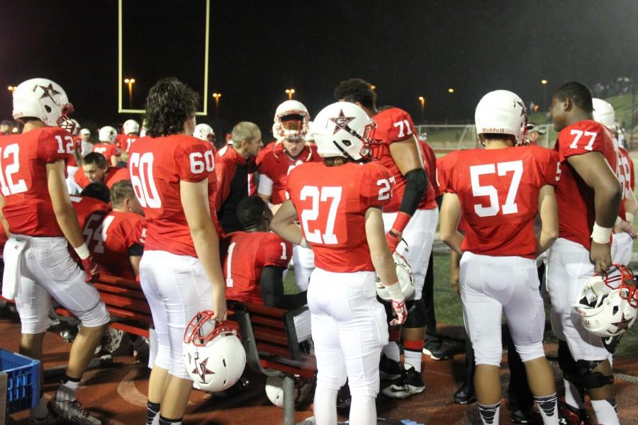 The offense watches the Coppell defense against Eastern Christian. Coppell won the game 42-2 on Sept. 12. Photo by Mallorie Munoz