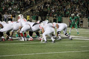 Senior quarterback Skyler Bonneau and the Coppell offense line up on the ball in Friday night's defeat to Southlake. Bonneau was eight for 16 passing for 101 yards and one touchdown. Photo by Mallorie Munoz.