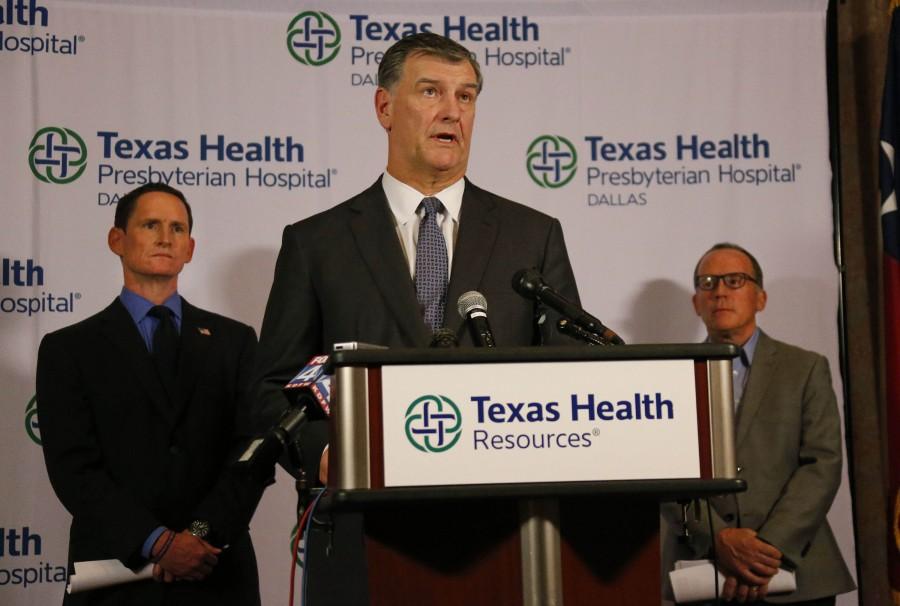 Dallas Mayor Mike Rawlings offers an assuring word as news reports of another Ebola victim surfaces during a press conference at Texas Health Presbyterian Hospital in Dallas on Sunday, Oct. 12, 2014. (Louis DeLuca/Dallas Morning News/MCT)