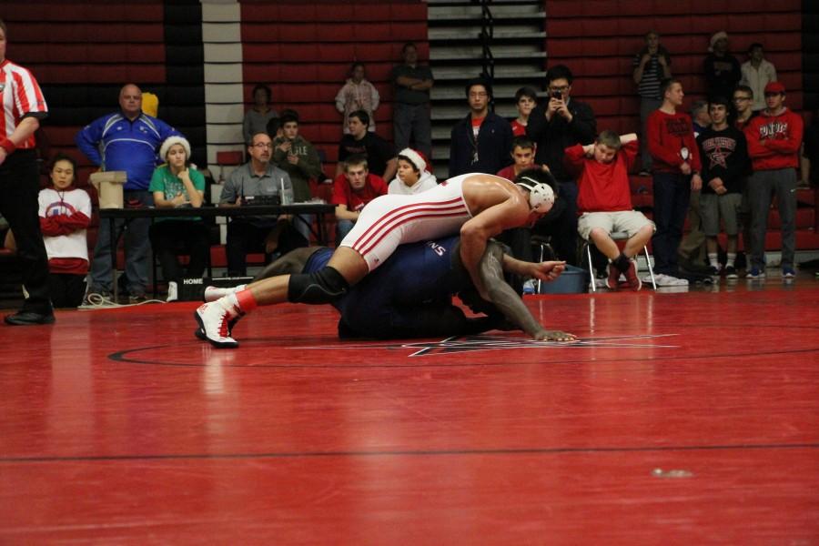 Murillo takes down Smith in the third round of the championship match. Photo by Nick Wilson.