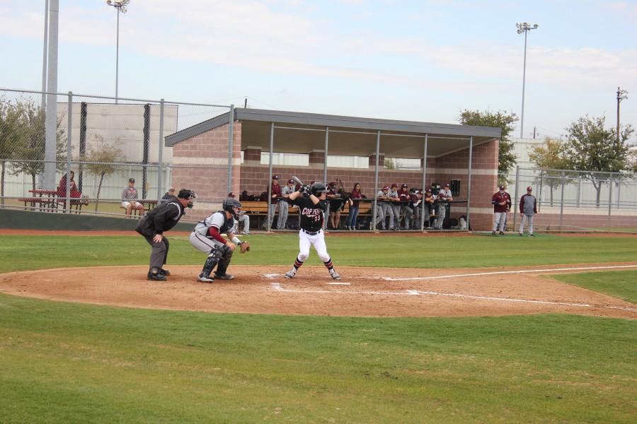 Senior right fielder Daniel Jones bats against the Rowlett pitcher in the fourth inning in the first game of the Scotland Yard tournament at Coppell Middle School West. Cowboys won 1-0 on March 12. Photo by Alex Nicoll.