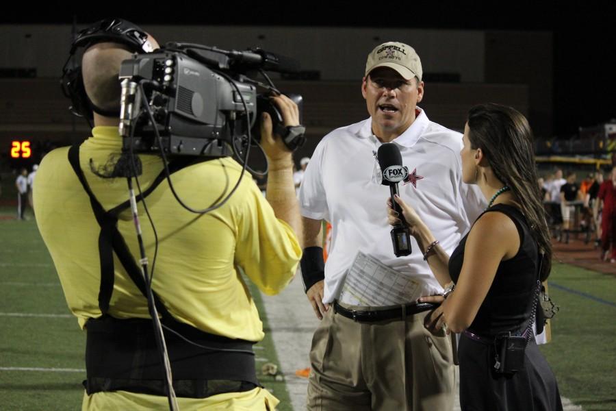 Coach Joe McBride talks to the media after Coppells 68-20 win over Rockwall on Sept. 13, 2014. McBride was announced as the new athletics director on April 8.