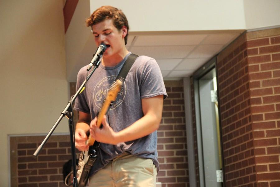 Sophomore Eric Loop preforms as lead singer of local band Auto. The benefit concert raised about 1,300 dollars for the  Brent Woodall Foundation. Photo by Amanda Hair. 