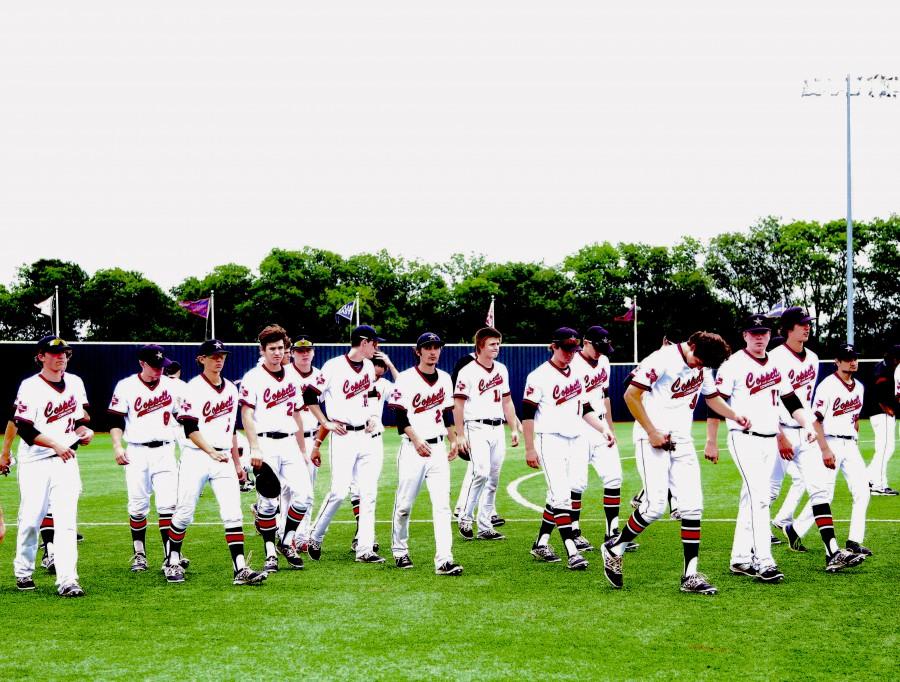 The Cowboys baseball team walk off the field for the final time this season after falling to Southlake Carroll 3-2. Photo by Shivani Burra.