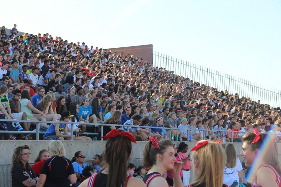 Students of Coppell High School make their way out to the stadium Friday morning for the first pep rally of the year. Cheerleaders, band members and many more share the spirit leading up to the night's football game against the Hebron Hawks. Photo by Chelsea Banks