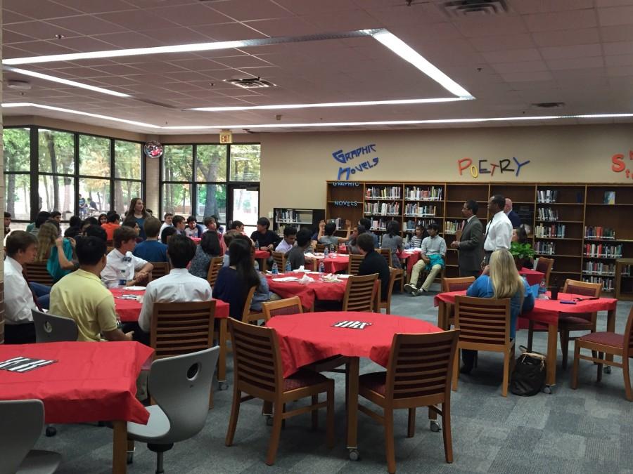 Coppell High School Merit scholar students come together during the luncheon to celebrate their work and accomplishments on their PSAT scores on Wednesday in the library. There was 113 students that were nationally recognized for their PSAT scores. Photo by Megan Winkle.