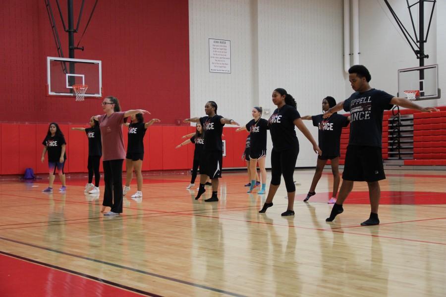 Coppell High School dance students learn their choreography for a jazz unit today during 5th period in the small gym. They plan to perform this dance later on this year in the spring show. 