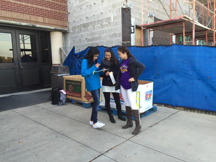 CHS sophomores and Student Council members, Riya Mahesh, Sol Hong, and Jasmine Lau, help out with the annual turkey drive on Nov. 20. Students and parents were able to donate turkeys and chickens to the North Texas Food Bank.