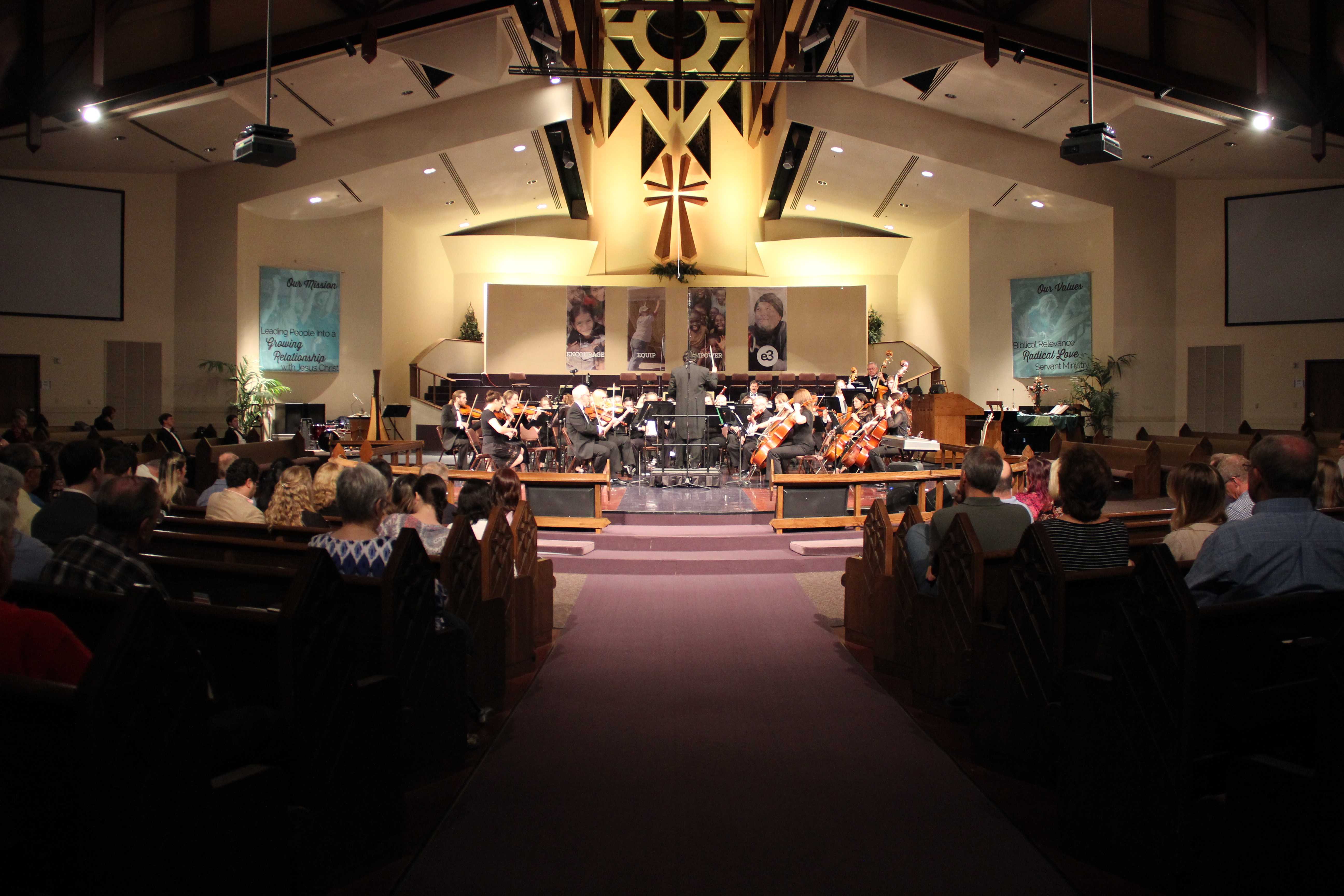 All strings attached; Kosh plays cello with Flower Mound Orchestra ...