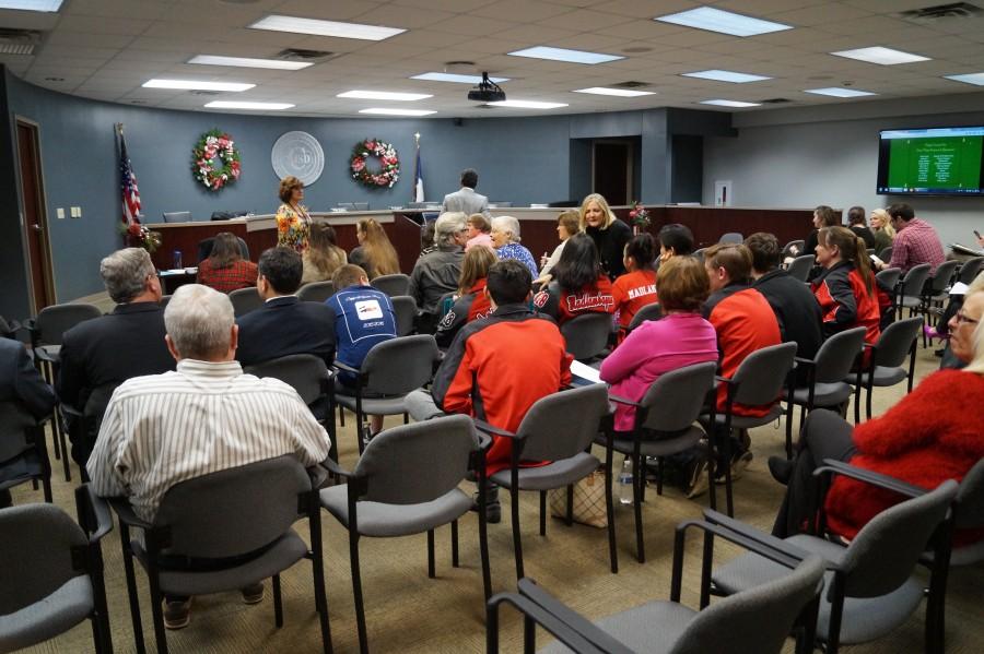 At Monday’s Coppell ISD Board Meeting, trustees  recognize students in various organizations throughout the district. As the meeting approaches the start, students organize themselves into the front rows.that are being awarded and recognized. Photo by Chelsea Banks.
