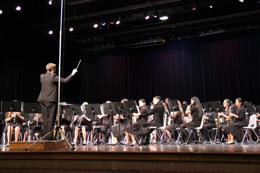 Coppell+Middle+School+East+band+plays+Pierre+LaPlante%E2%80%99s+%E2%80%9CMonterey+March%E2%80%9D%2C+conducted+by+the+band+director+Joshua+Boyd+during+the+Pre-UIL+contest+on+Tuesday+in+the+Coppell+High+School+auditorium.+The+bands+from+all+three+middle+school+of+Coppell+ISD+performed+in+front+of+parents+and+judges+during+the+Pre-UIL+contest.+Photo+by+Ayoung+Jo