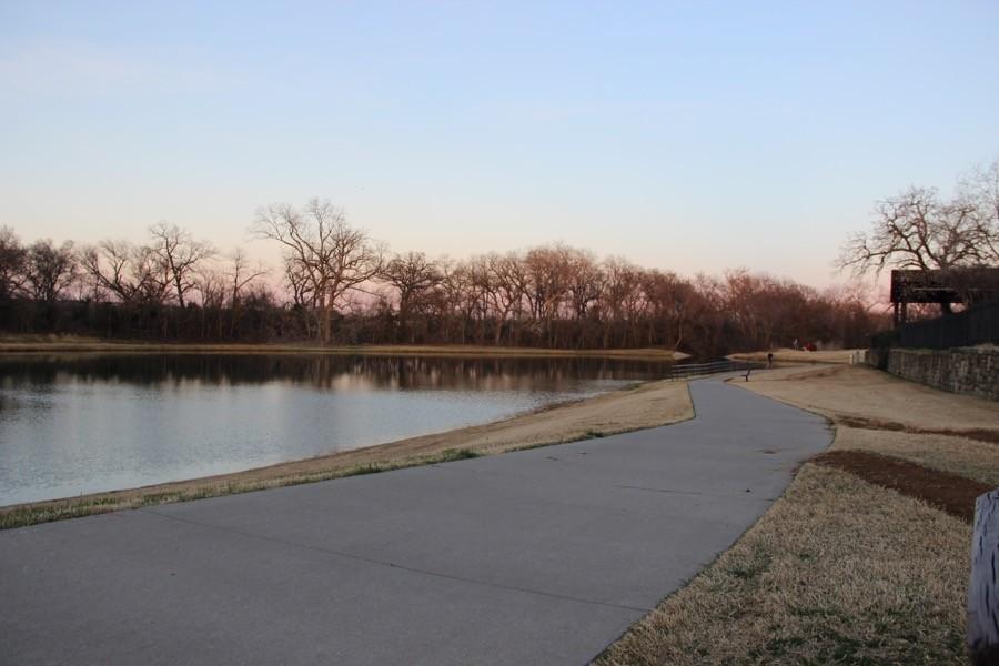Andy Brown Park West has a nice running trail around the lake thats about 1.5 miles, it also has some basketball, volleyball and soccer courts where you could work out. The park is located at 363 N Denton Tap Road in Coppell.
