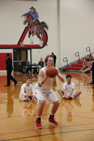 Coppell High School senior Luke Heaton shoots free throws to get ready for the game against Richland on Friday. Coppell defeated Richland 53-50 in the big gym at Coppell High School.