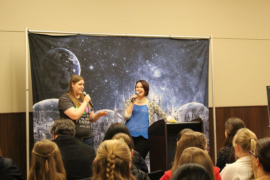 Young+adult+novelist+Marissa+Meyer+answers+audience+questions+during+the+Q%26A+portion+of+her+visit+to+the+South+Irving+Library.+Meyer+came+to+Irving+on+Saturday+to+speak+about+her+newest+novel%2C+Stars+Above%2C+which+is+set+in+the+same+world+as+her+popular+series%2C+The+Lunar+Chronicles.+Meyer+also+announced+that+she+will+be+writing+graphic+novels+based+on+The+Lunar+Chronicles+in+the+upcoming+months.