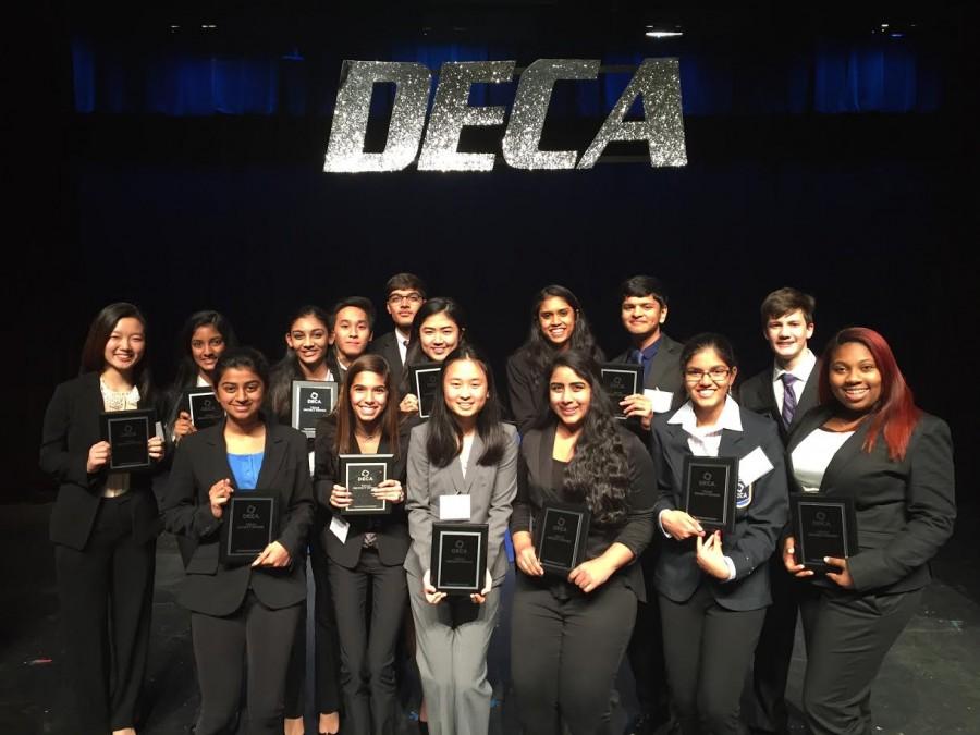 All 15 members from the Coppell High School DECA team celebrate their win at competition at North Garland High School on Saturday. Photo courtesy Sakina Deresalamwala
