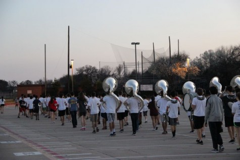 Coppell High School Band practices two songs, Patriotic Medley and Uptown Funk, on Feb. 29. The band practices Monday and Friday after school before Spring Break to be prepared for the 15th annual Saint Patrick’s Day parade in London. 