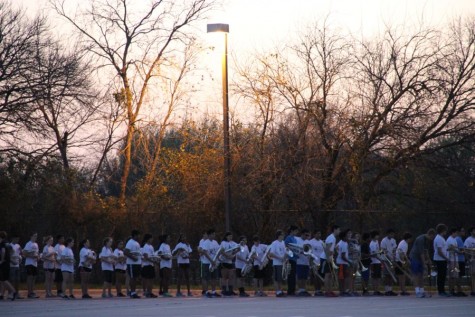 Coppell High School marching band practices for the 15th annual Saint Patrick’s Day parade in London on Feb. 29. The band works to perfect their lines and turns to prepare for the London streets. 