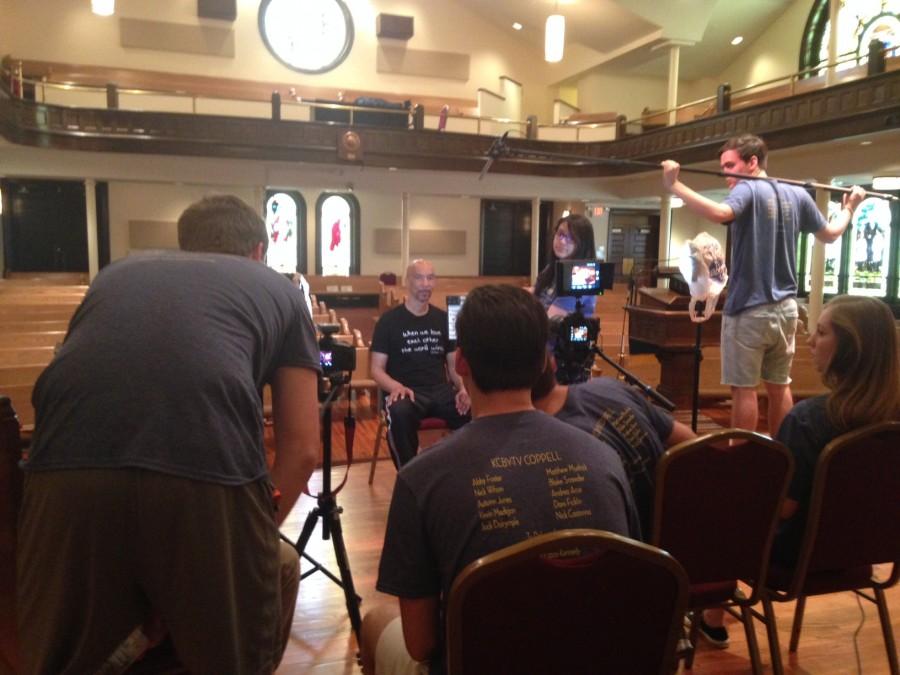 KCBY-TV staff members set up production at the First Congregational United Church of Christ in Atlanta on Thursday for their Crazy 8 Short Film Documentary at the Student Television Network Convention. KCBYs film features the Common Ground group which meets at the historic church in downtown Atlanta.